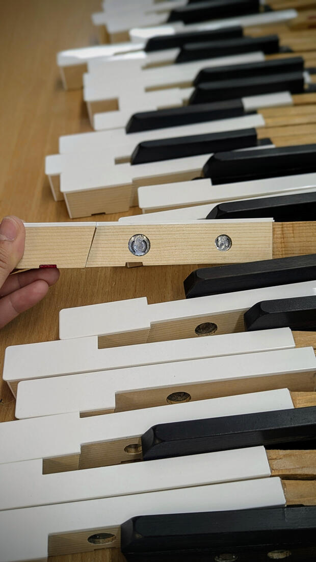 Key weight balancing involves precisely adjusting lead weights within the keys to ensure a uniform, responsive touch across the entire keyboard. This critical piano action restoration restores the effortless control and professional feel of a Steinway.