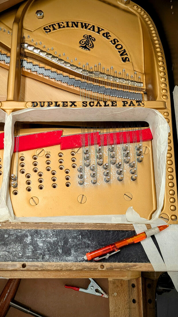 Steinway grand piano restringing replaces old wire with premium piano strings and new tuning pins for maximum stability. This restores the original clarity, power, and signature sustain of a Steinway & Sons piano.