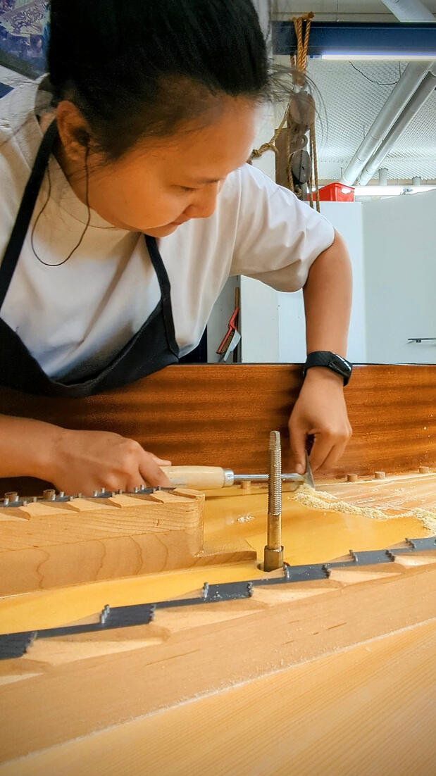 Piano soundboard refinishing applies specialized musical instrument lacquer to seal and protect the spruce from humidity. This final restoration step enhances the board's natural beauty and ensures long-term tonal stability.