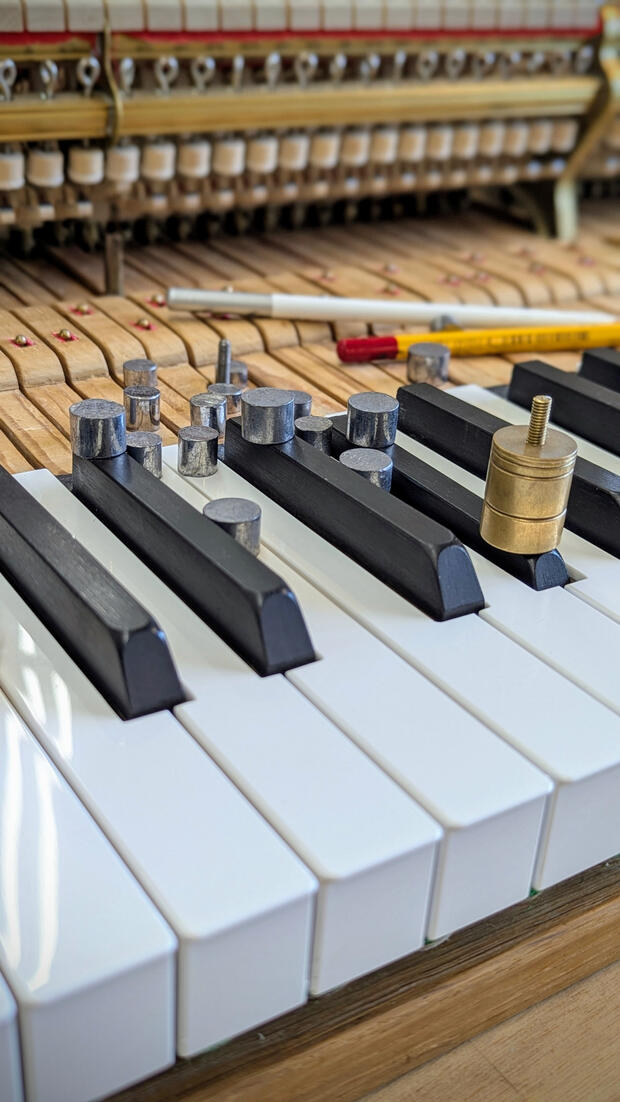 Keyweight balancing and its connection with sound and touch